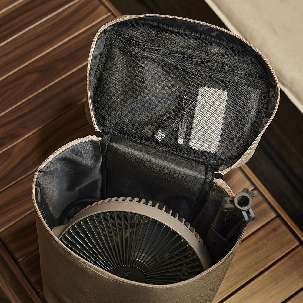 Open V1040 size pouch showing the fan inside and accessories in the mesh lid pocket
