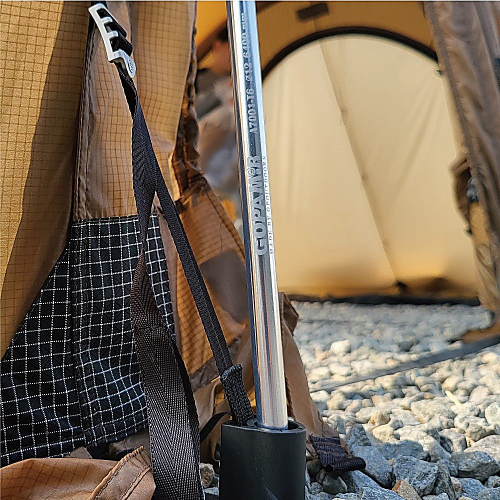 Close-up of the T720+ spare pole shaft printed with Gopamir branding and 19 mm diameter spec, tent strap alongside