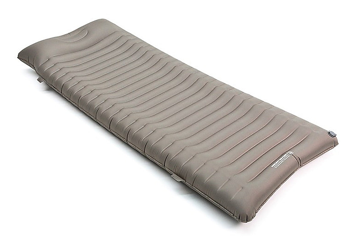 Sky Mat Wave 77 insulated sleeping pad inflated on white, three-quarter view of the wave sleeping surface.