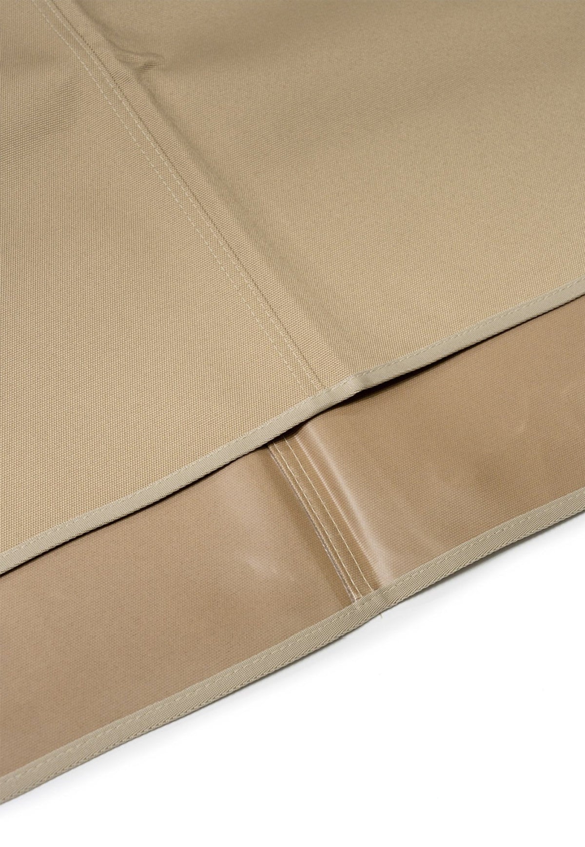 Tan sheet folded back to show the coated underside and the sealed centre seam