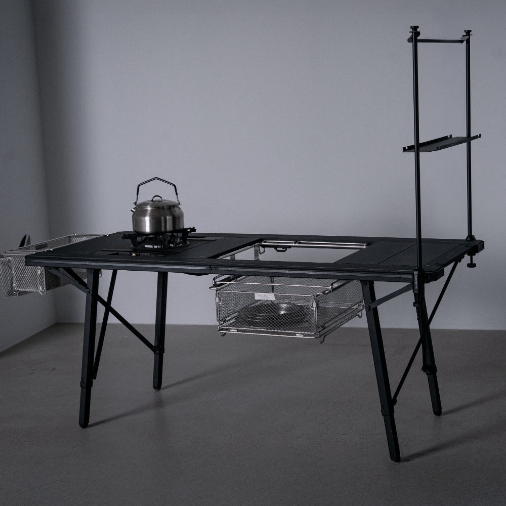 BUENOFE IGT Rail Frame 1.5 in a camp kitchen setup with a kettle on the table and a lantern pole alongside