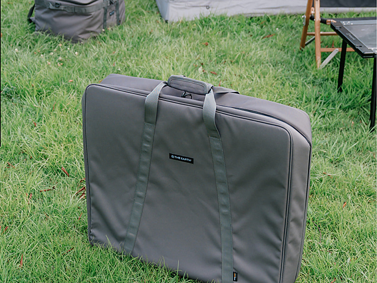Wolf Grey CORDURA FD Chair Case standing upright on grass at a campsite