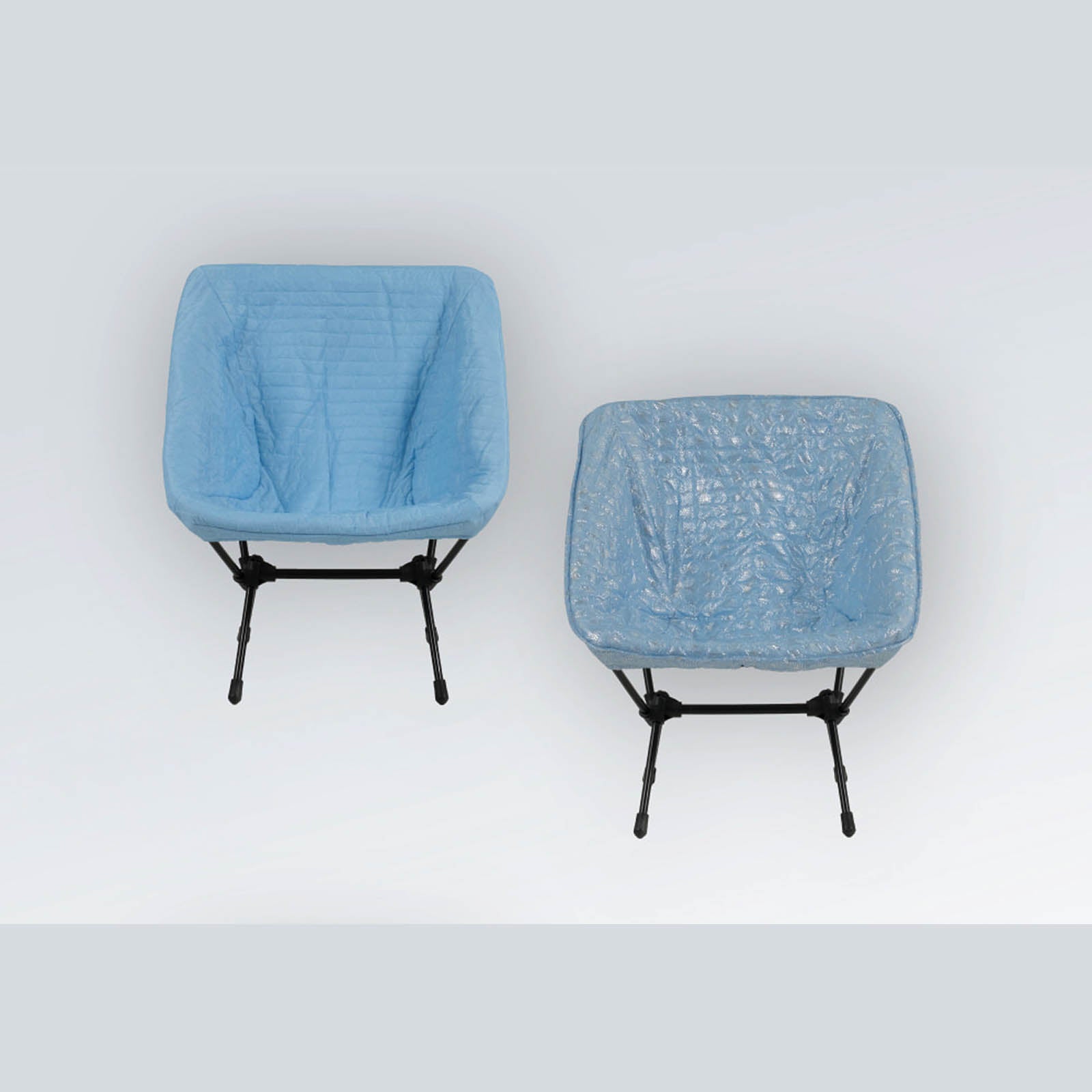 DEOS Chair Warmer in sky blue — quilted face and heat-reflective side on a camp chair