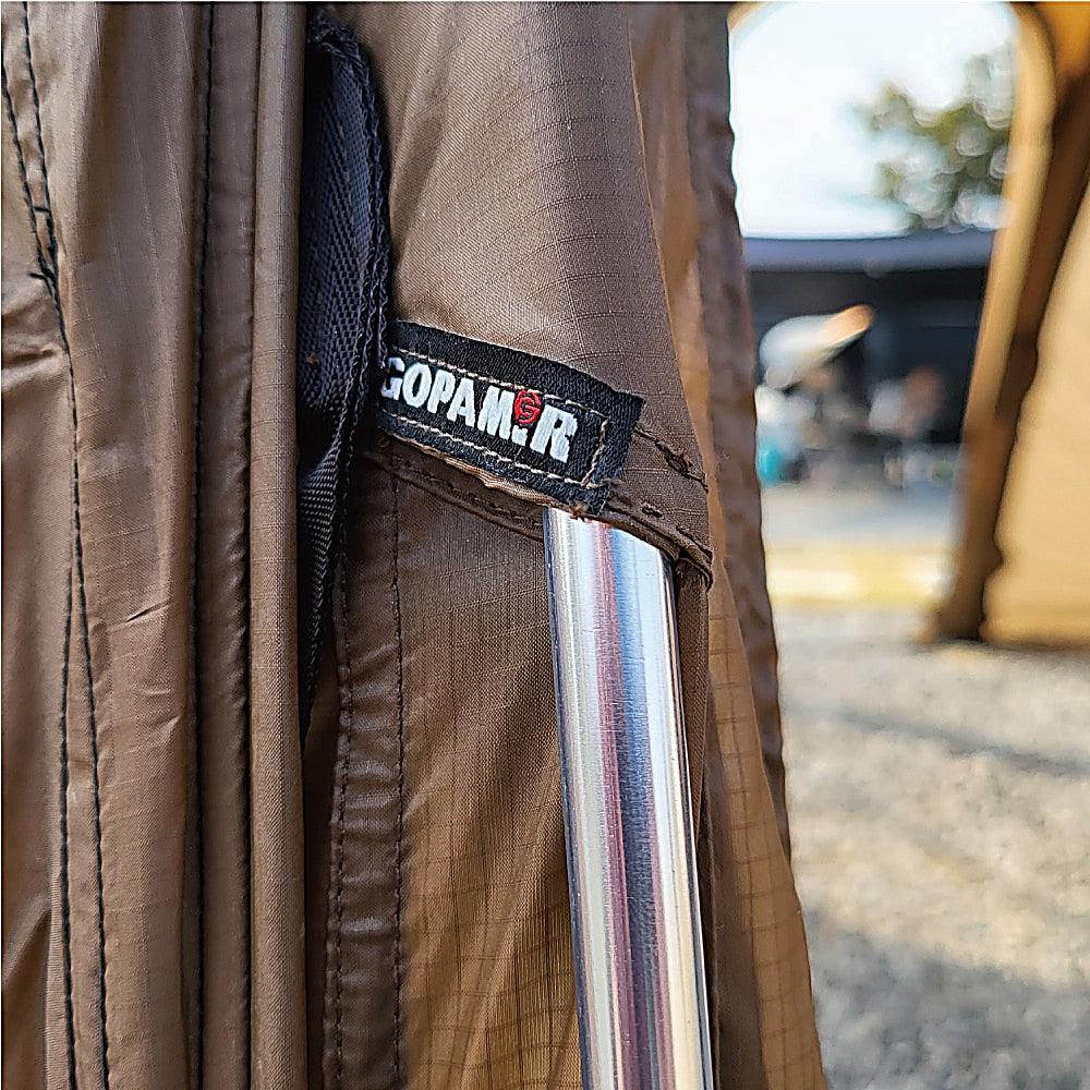 Spare pole inserted into the shelter's air-beam sleeve at the GOPAMIR labeled point