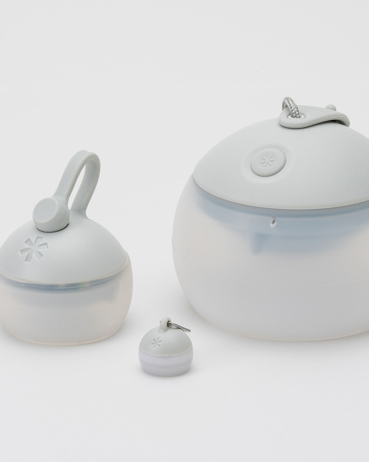 Micro Hozuki, Ivory, shown beside the larger Hozuki lanterns for scale