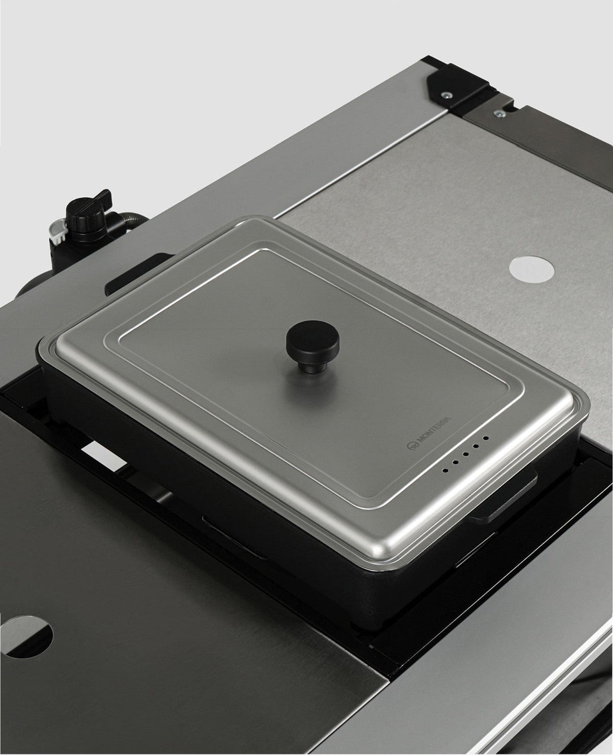 Monterra hot pot pan cover seated on the hot pot pan of an Add-on Multi Burner