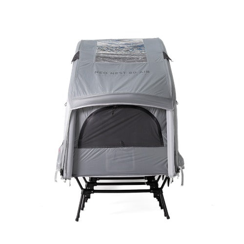 Neo Nest 80 Air with the included roof cover fitted, studio front view on a camp cot (cot sold separately).