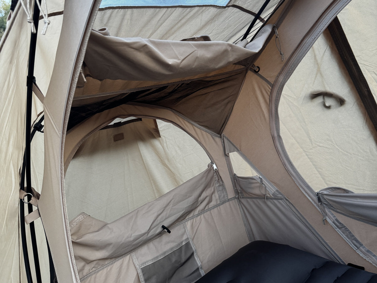 Inside the Neo Nest 80: roof loft, mesh pocket and end-wall mesh window, Sky Mat on the cot (cot and pad sold separately).