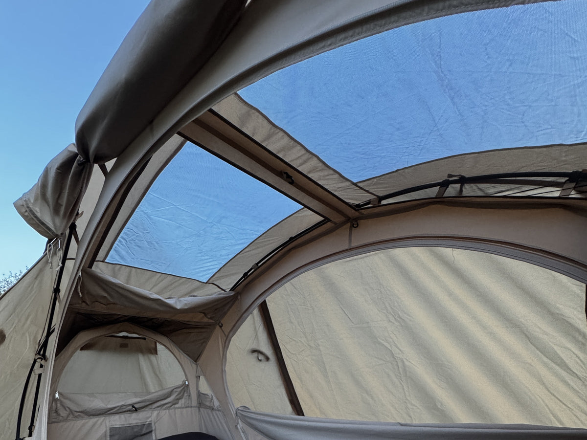 Daylight through the rainfly roof window onto the mesh ceiling and loft of the Neo Nest 80 (tent and pad sold separately).