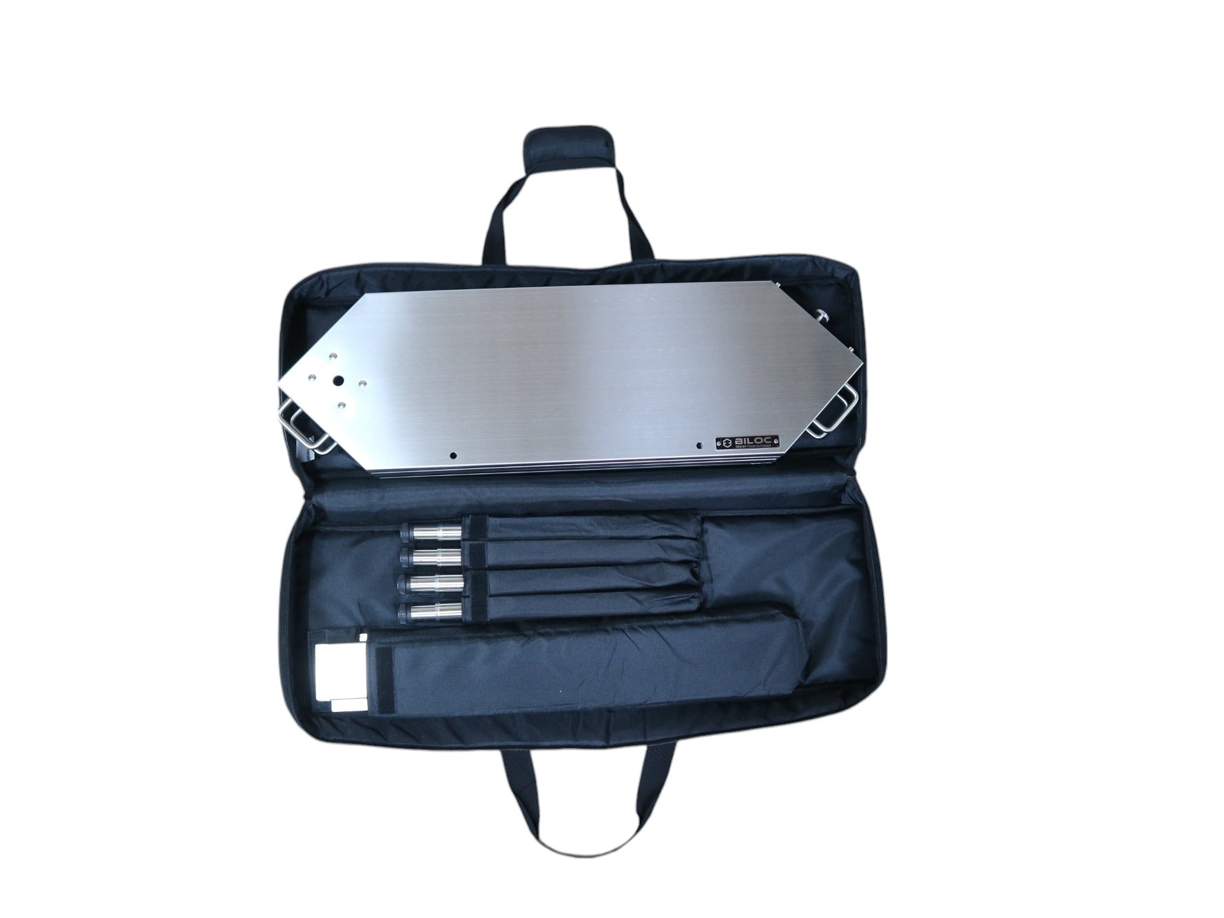 Open padded carry bag with the folded table in the top compartment, four legs in individual sleeves, and the inner table below.