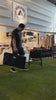 Setup walkthrough: the Biloc Stella IGT camp shelf lifted out of its carry bag, unfolded into a three-tier stand, fitted with a side basket and an IGT burner, and used as a standing camp kitchen.