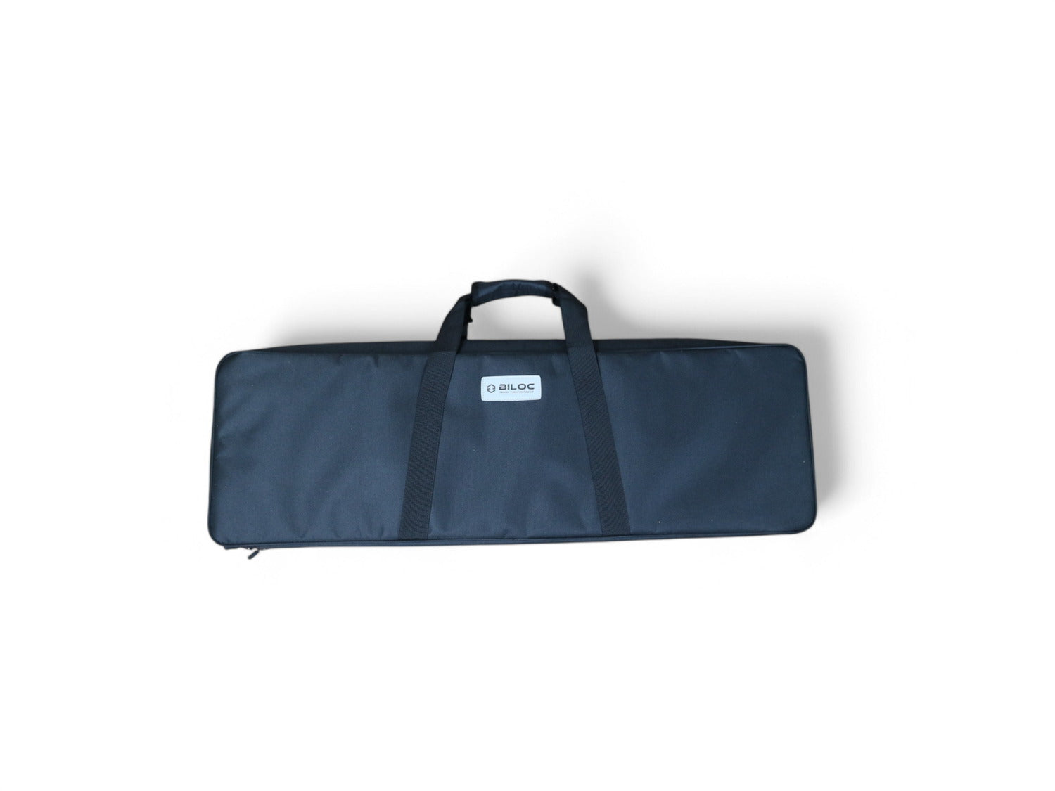 The Ribera carry bag closed, showing how flat the folded table travels.