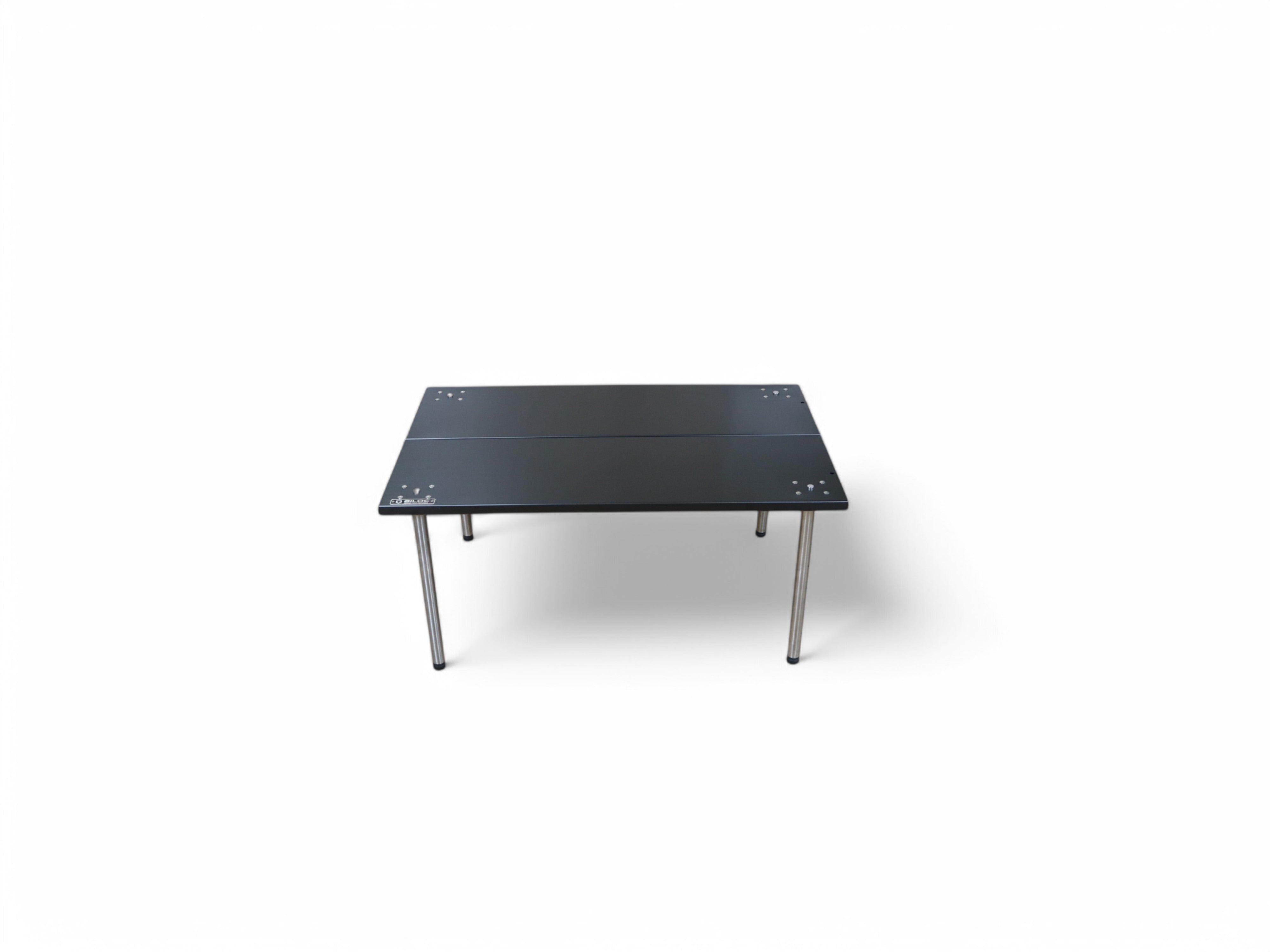 Black Ribera table standing on its own four adjustable legs, each ending in a threaded levelling bolt. Free-standing setup needs a second pair of legs, sold separately.
