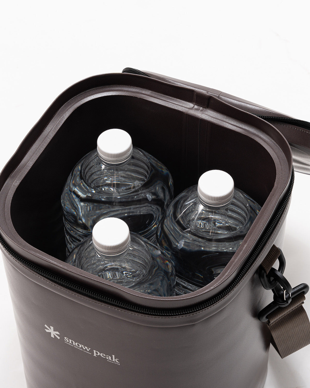 Soft Cooler 13, Tan, holding three 2L bottles upright