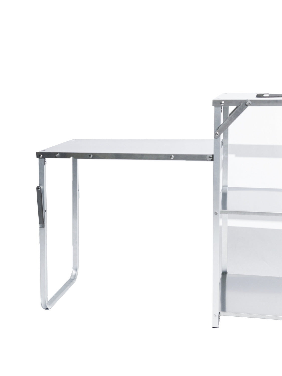 The fold-out side table extended with its U-tube support leg standing.