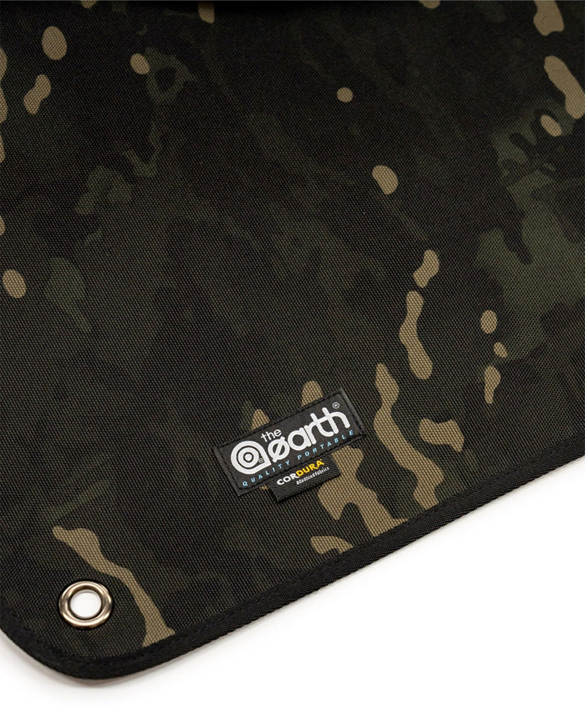 Black Multicam corner with the theEarth label and a metal eyelet