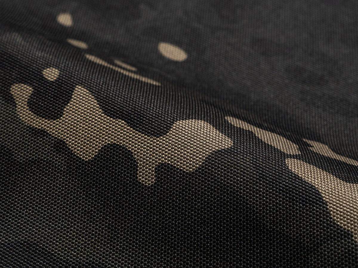 Close-up of the Black Multicam CORDURA weave on the top face