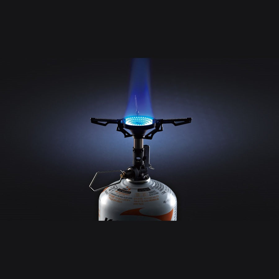 V1 Stove burner head lit with a blue flame